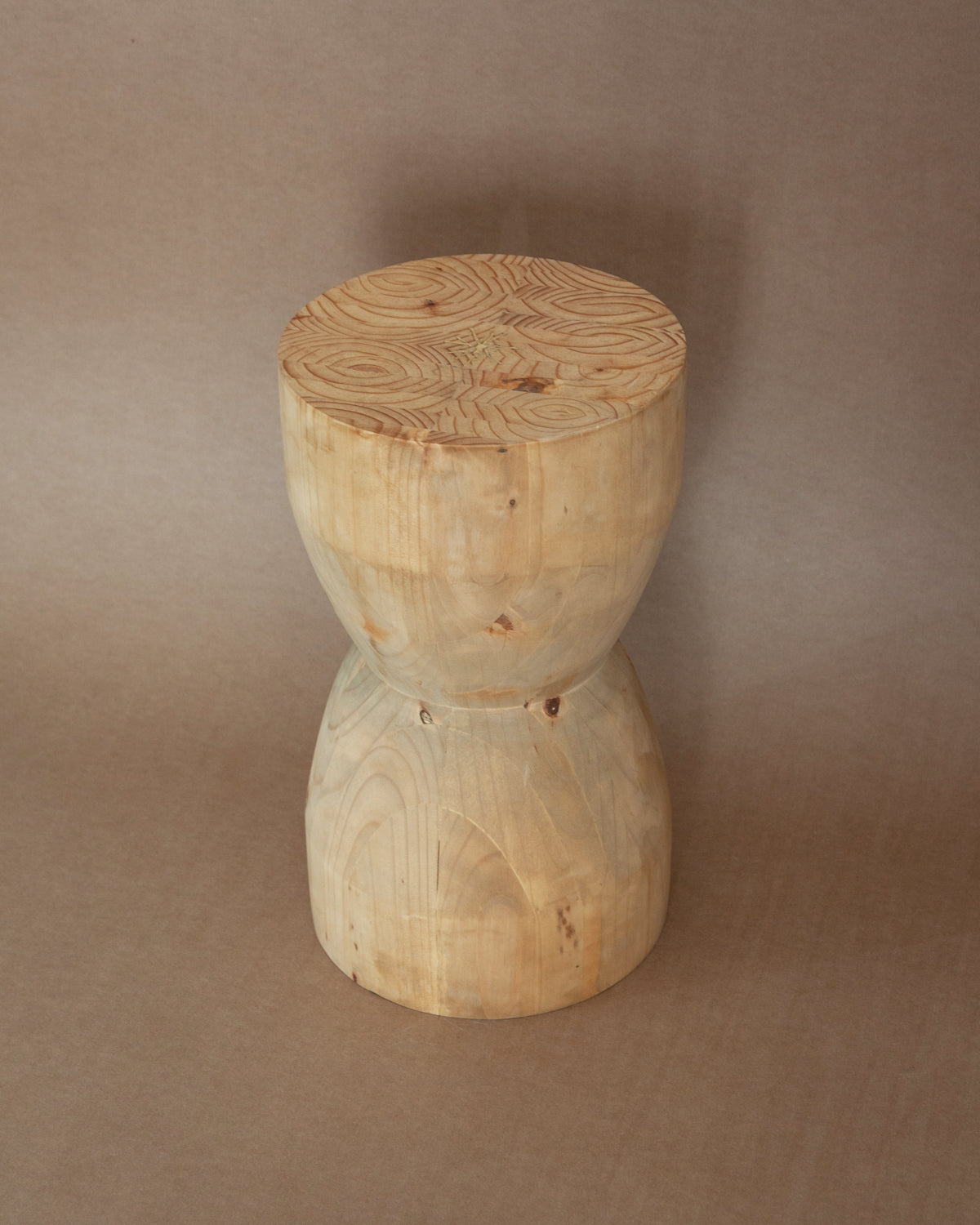 Turned hourglass stool in Pine